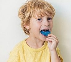 Patient fitting his athletic mouthguard for kids in Hurst, TX.